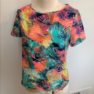 Multi colored short sleeve top with teal zipper